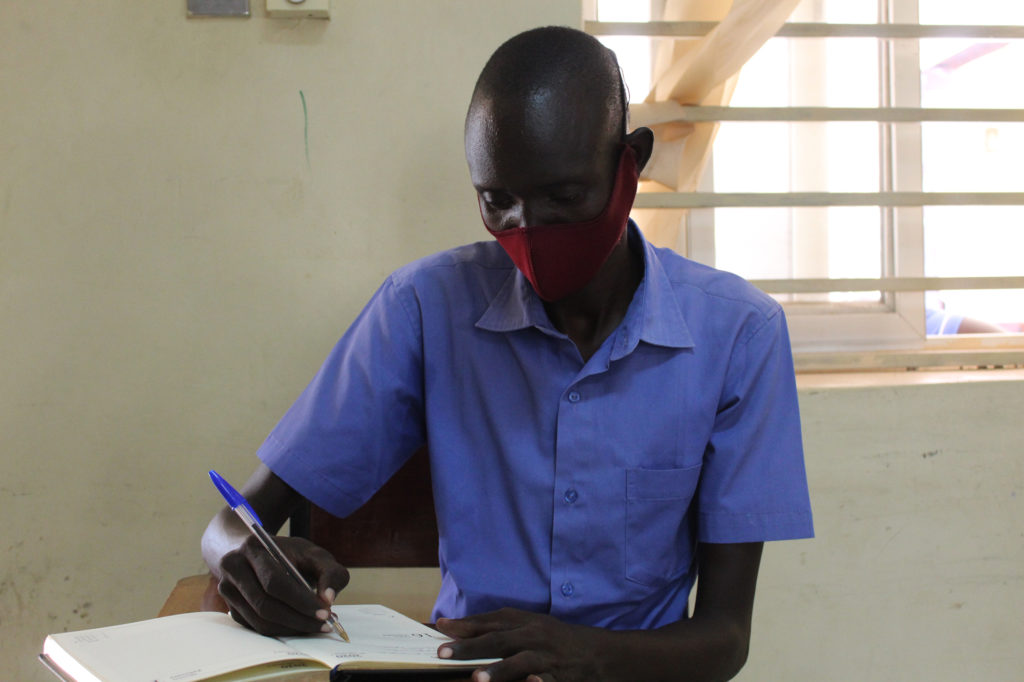 Bona Bol prepares for his final nursing exams at Juba College of Nursing and Midwifery. He is determined to excel in the program and treat patients in his community.