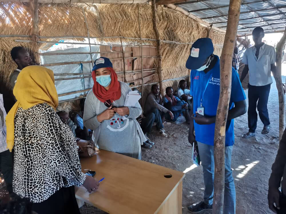 Community health volunteer training on COVID prevention and community engagement in Hamdeyet Camp, Kassala, Sudan.