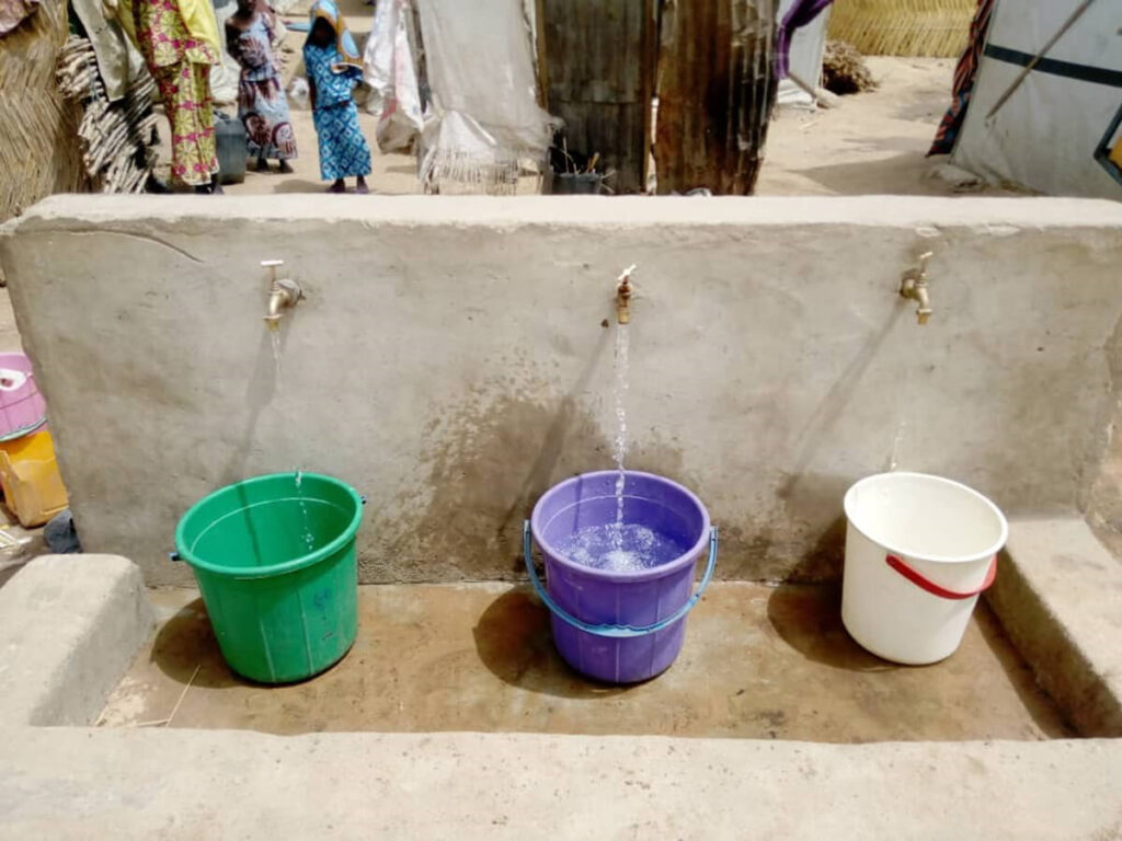 Clean water flows easily from taps in Damboa, Nigeria, thanks to the solar-powered borehole water system.
