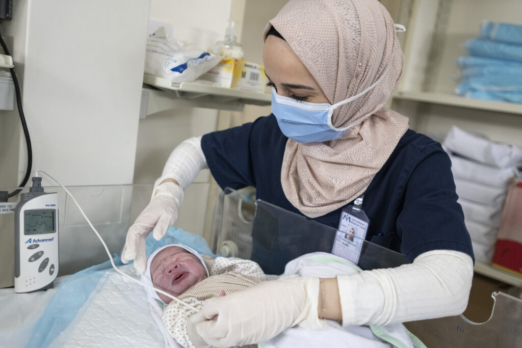 International Medical Corps midwife Yasmin Bishtou at work in the Maternity ward, Irbid Specialty Hospital. Irbid, Jordan.