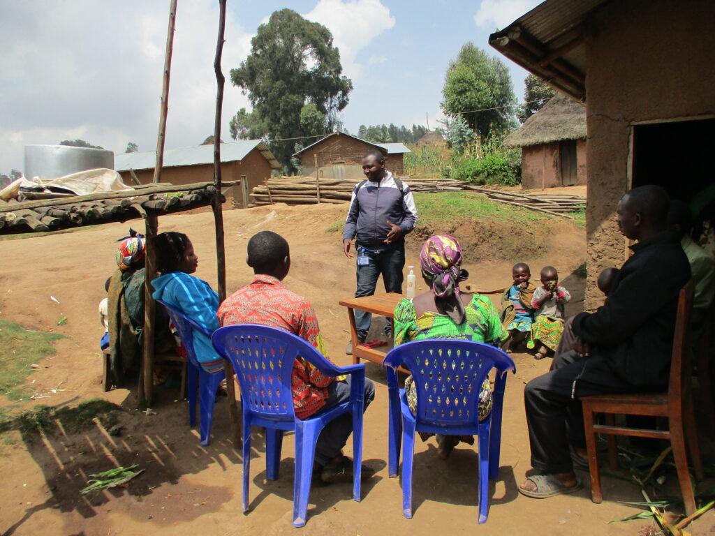 Christophe Nzanzu, a social mobilizer in Butembo, spreads Ebola prevention messages in Kitsuku Village, North Kivu province.