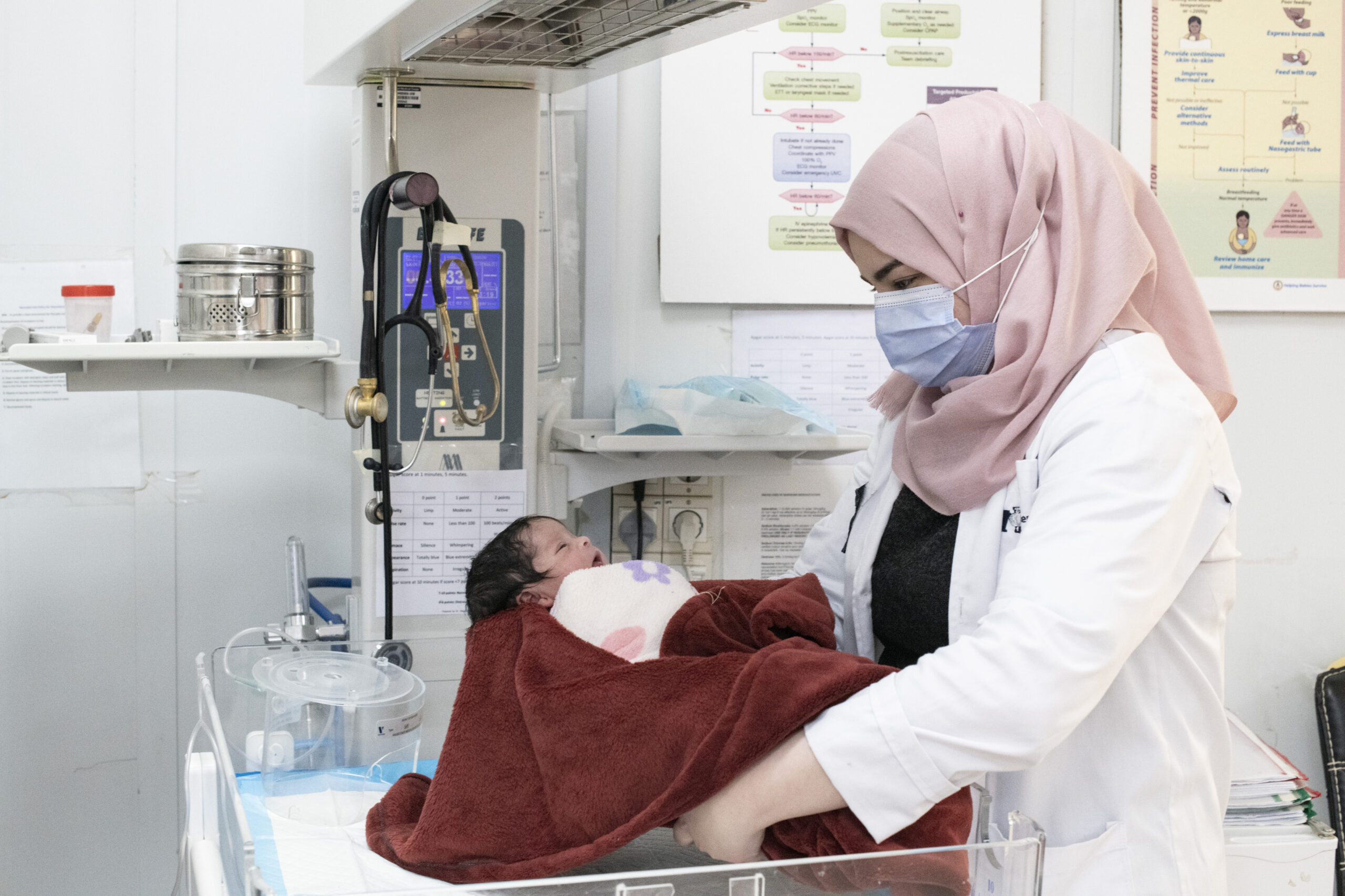 IMC nurse Ghadeer abu Mel'a at work at the maternity ward, in Al Azraq camp hospital.