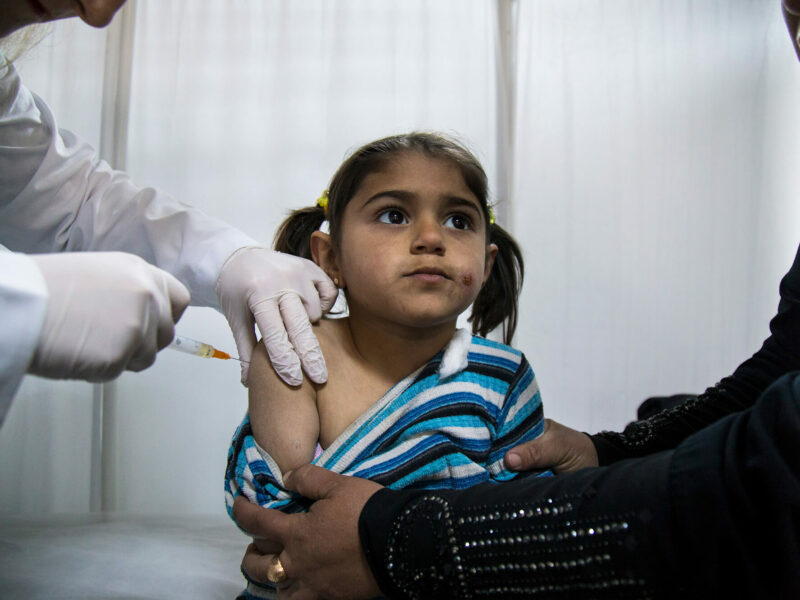 Five-year-old Dala Moustafa receives routine vaccinations at International Medical Corps' clinic in Kilis, a town just a few miles from the Syrian border in Turkey.