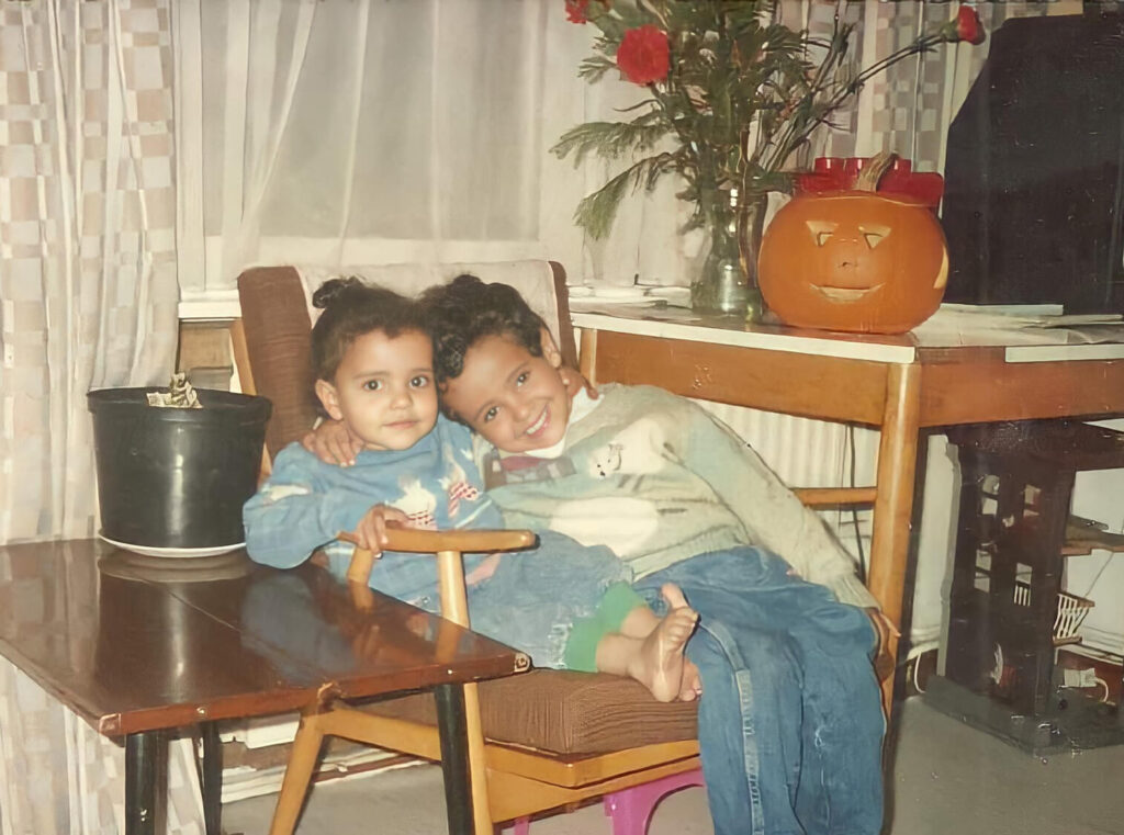 Fayad, age 7, with his younger sister Fatima, 2, celebrating Halloween in London in 1996.