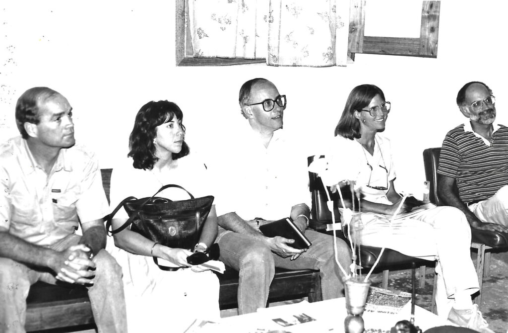 Garvelink (center) in Jonas Savimbi’s bunker during a meeting between the Angolan rebel leader, USAID officials and International Medical Corps, whose CEO Nancy Aossey is seated to the left of Garvelink.