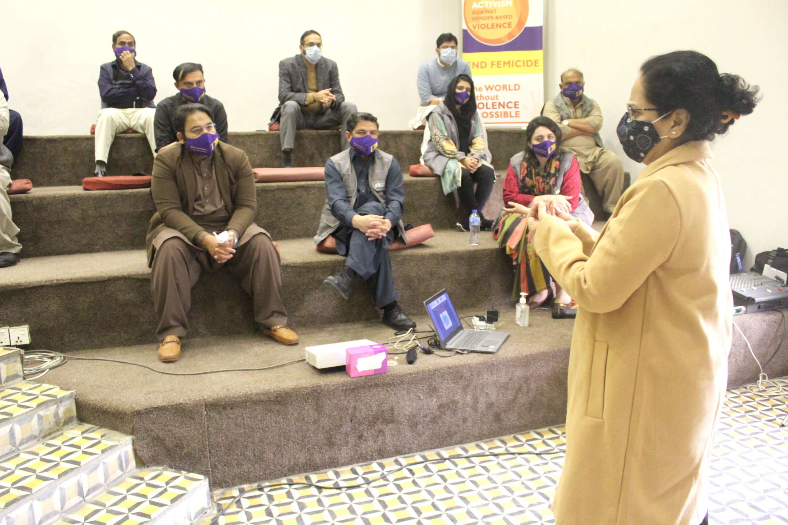 Our team in Pakistan discussing the importance of the 16 Days campaign.