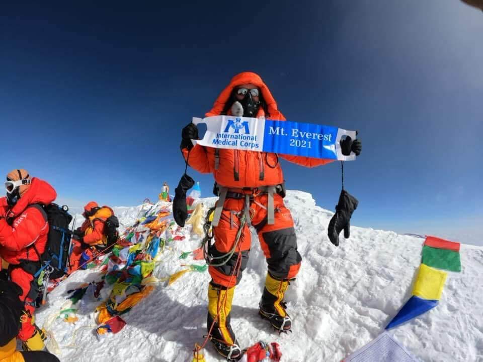 Dr. Paterson on top of Mount Everest.