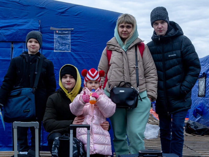 38-year-old Olga poses for a photo with two of her children and two nephews next to the luggage with which they arrived from the Ukrainian city of Vinnytsia. Olga has also been traveling with her parents, who preferred not to pose for the photo on March 06, 2022 in Siret, Romania.