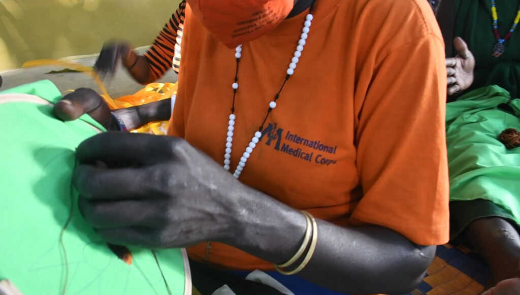 Women learn handicraft skills at the Women’s and Girls’ Safe Space in Nyal, South Sudan.