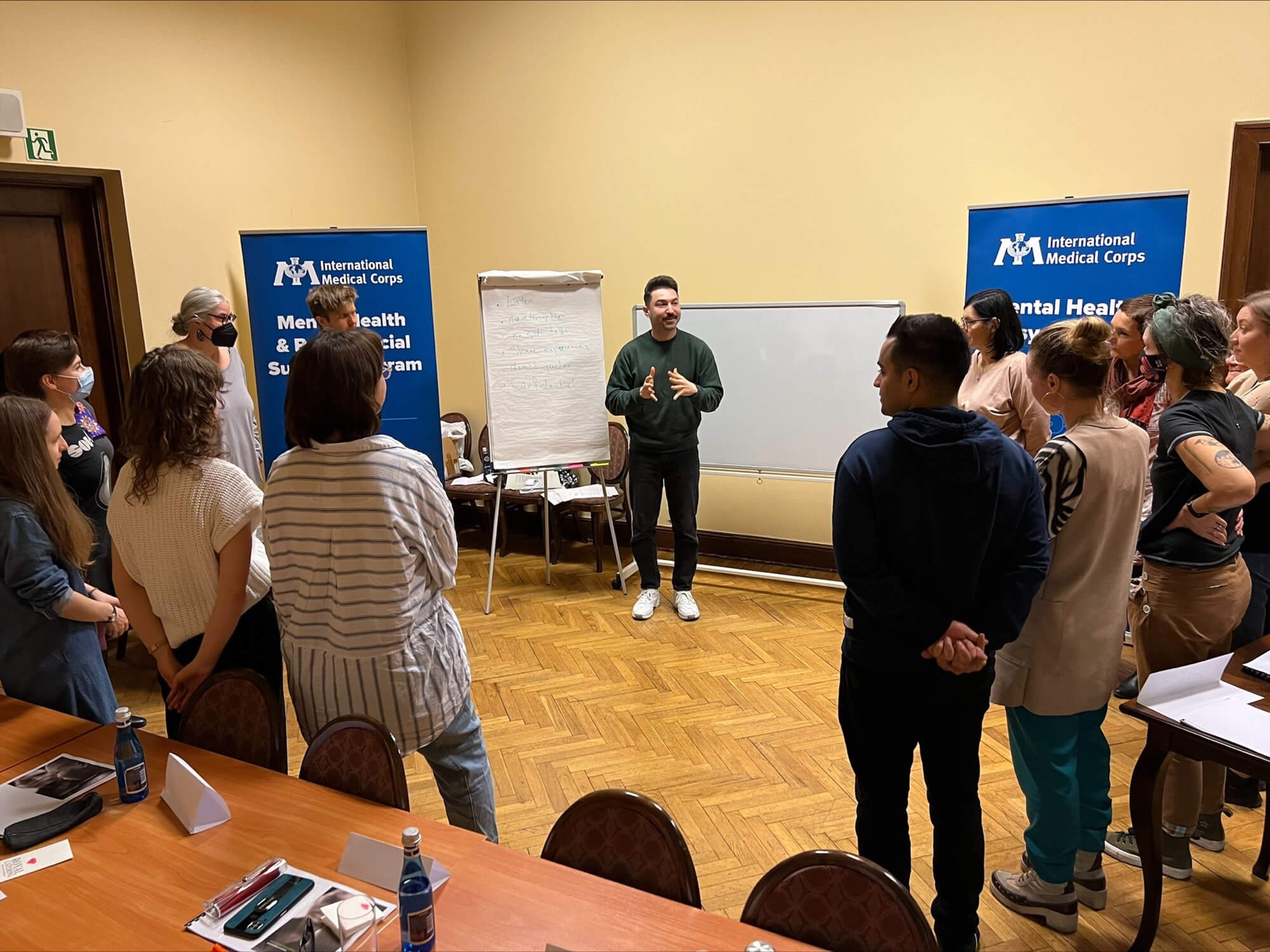 An International Medical Corps Consultant provides training in psychological first aid (PFA) to frontline workers in Poland.
