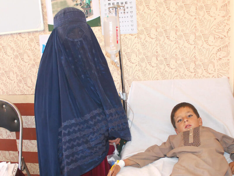Zar Bibi waits with her son as he recovers at International Medical Corps’ new health center in Dehsabz district, Afghanistan.