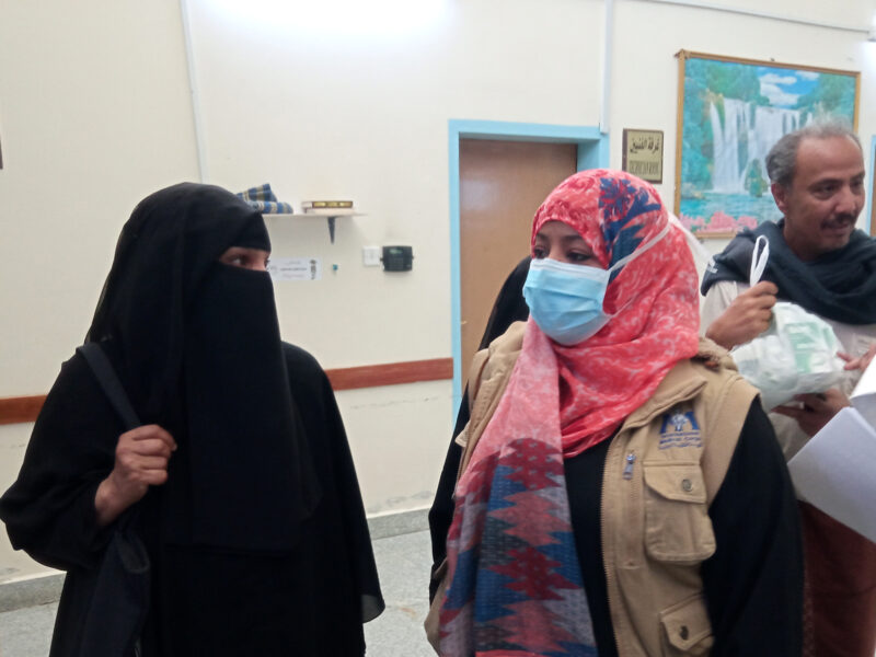 International Medical Corps Programs Manager Nebras Khaled talks with aa former breast cancer patient who was discharged earlier this year as cured following her treatment at the NOC.