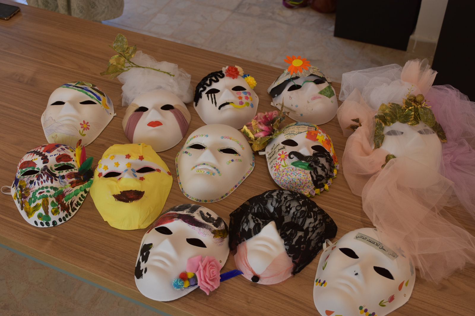 Participants in the workshop made colorful masks to reflect on identity and social support.