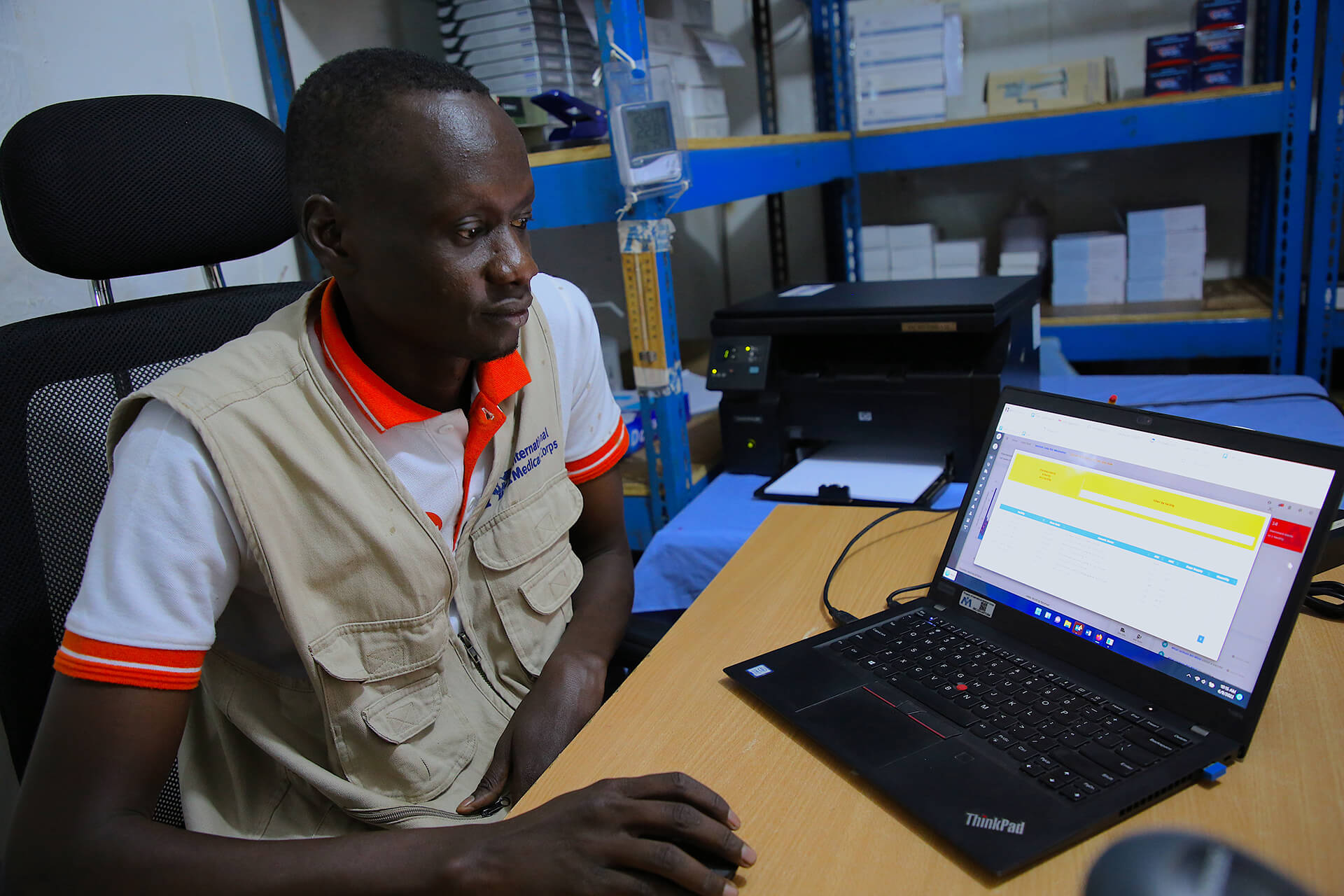 Nhial Bol, Pharmacy Supervisor in charge of the Juba IDP camps, uses PIMS to analyze consumption and prepare a re-supply request.