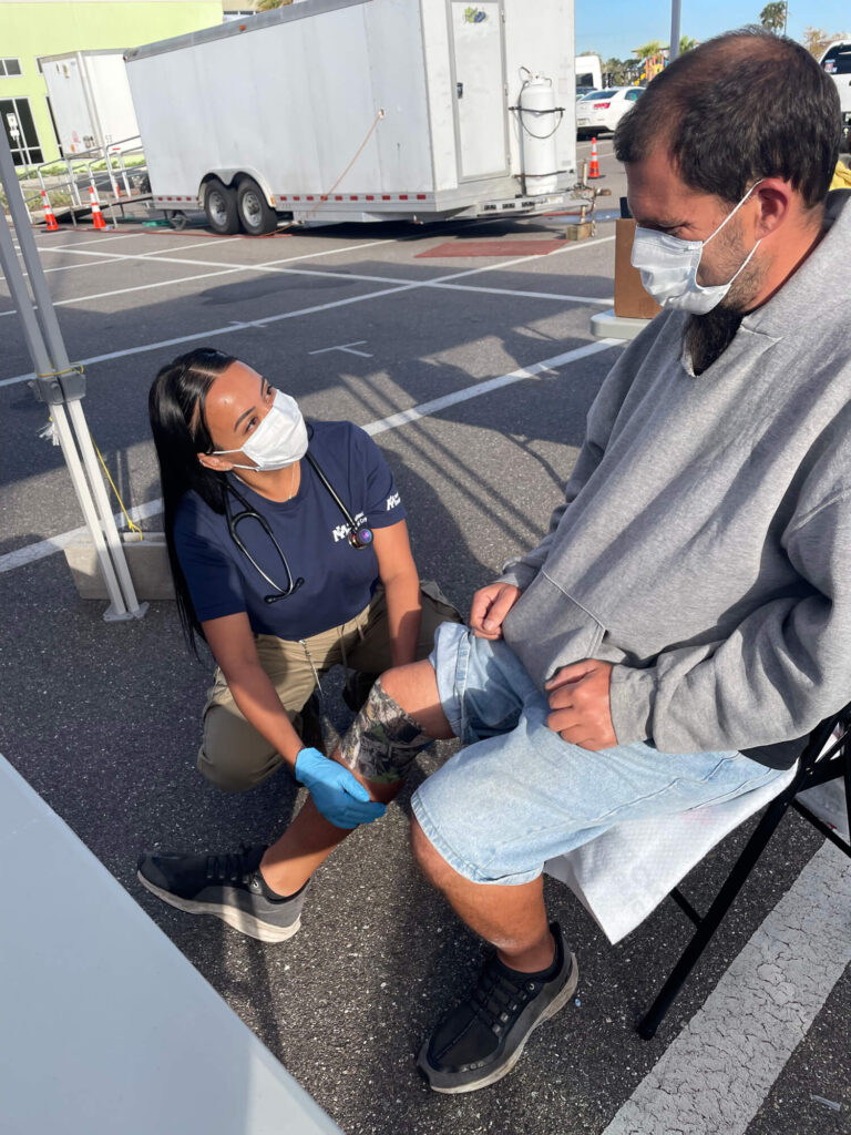 MediSys nurse Jannina Rivera helps a patient at our mobile medical unit in Florida.