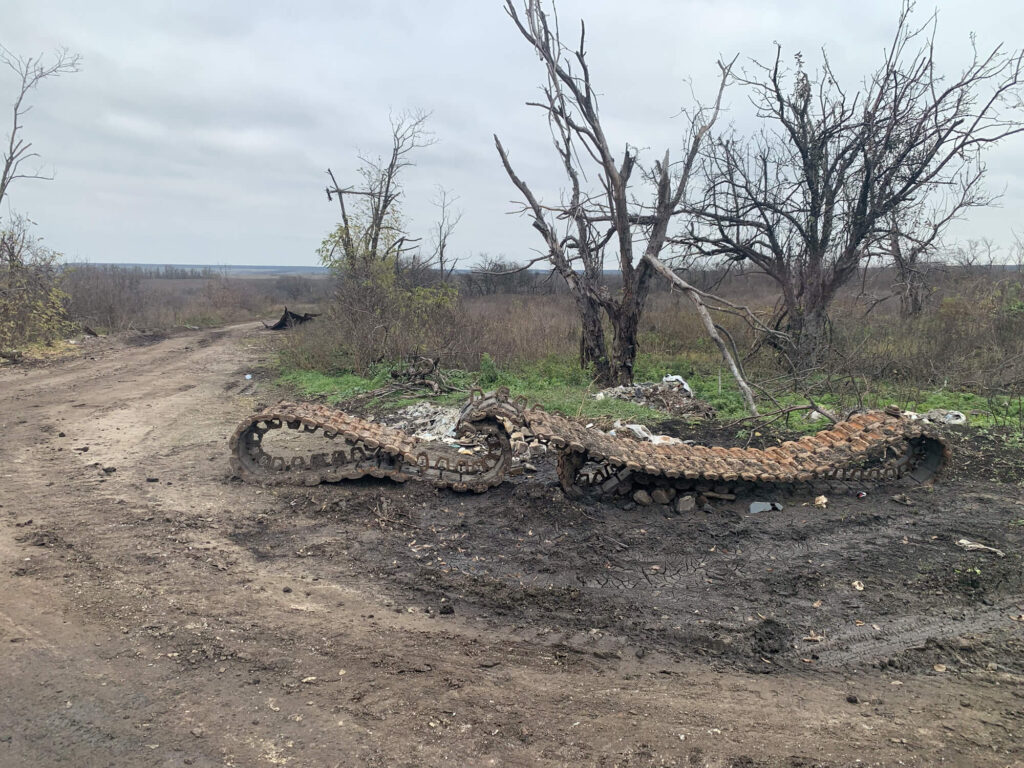 The remains of a destroyed tank lay on the roadside in Dovhenke, a village in Izyum district.