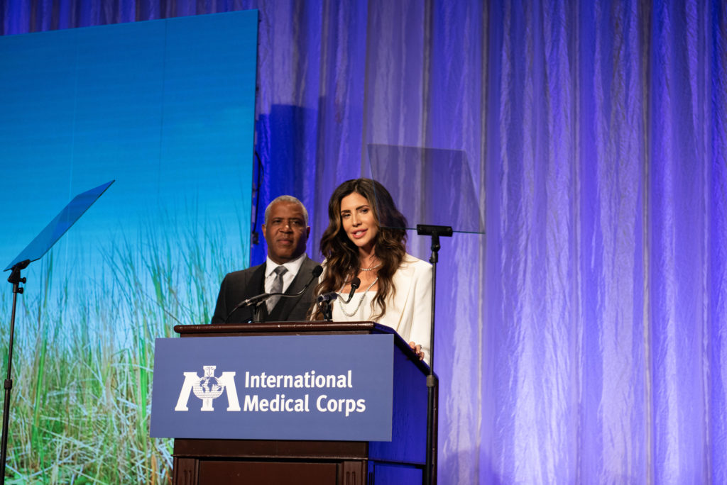Hope Dworaczyk Smith and husband Robert F. Smith accept the IMC Humanitarian of the Year Award at a 2018 ceremony.