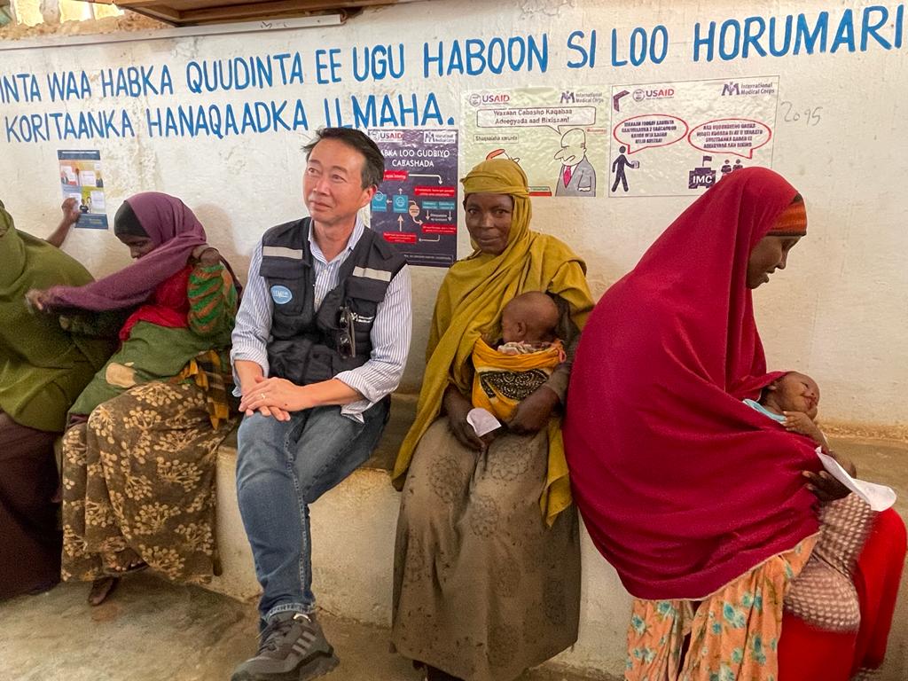 Ky Luu ruminating the information shared by a mother seeking nutrition service for her malnourished daughter at Berdale Health Center, Baidoa.