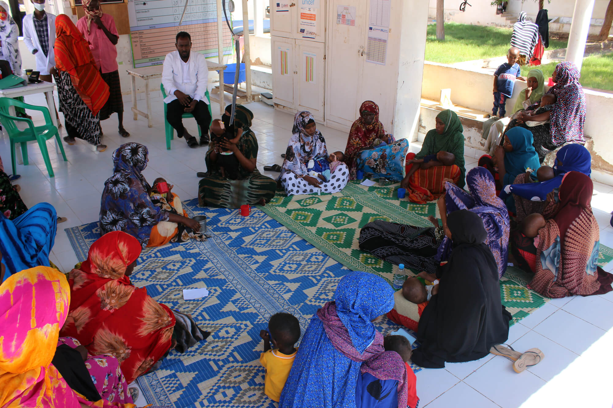 A nurse conducting training on proper breastfeeding and proper hygiene practices for mothers at the GAS Hospital.