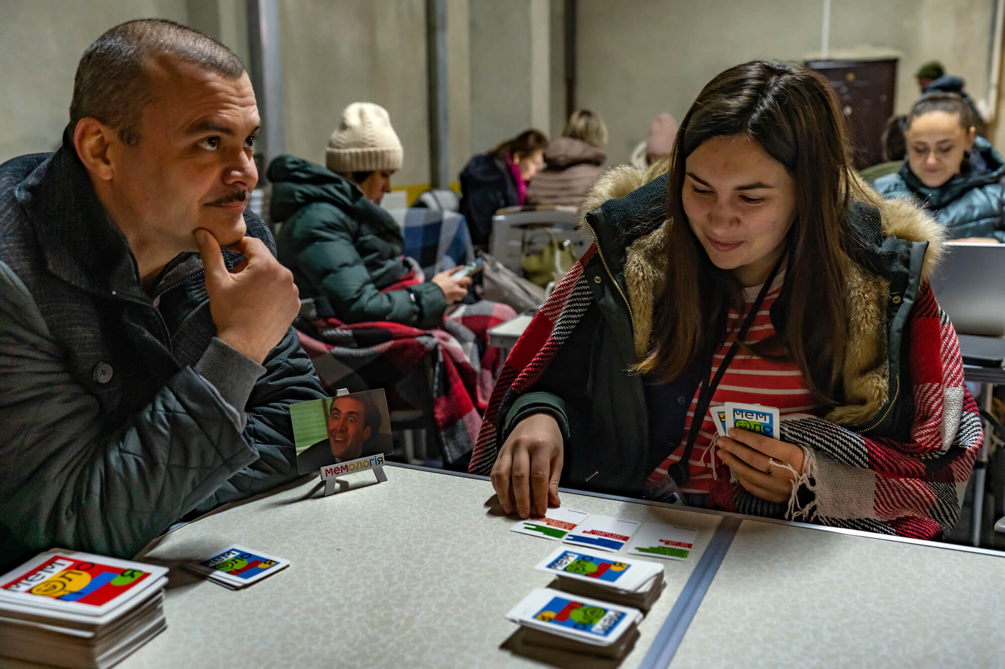 most staff member are working on laptops or phones, while a few who have jobs that can’t be done while sheltering in place—such as drivers—pass the time by playing cards.