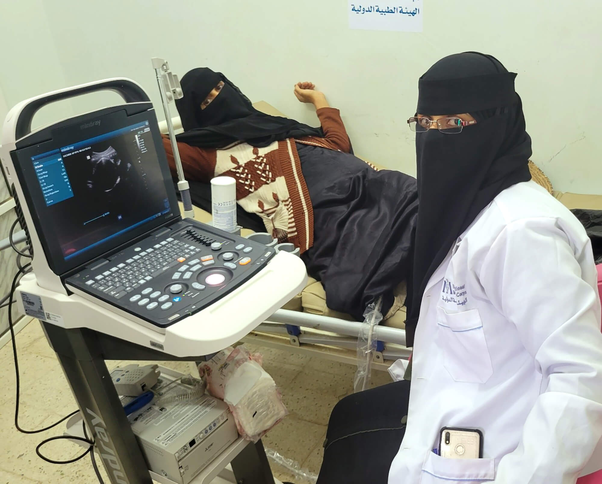 Midwife technician Ebtisam Al-Zaidi examines a pregnant woman at a health center in Yemen.