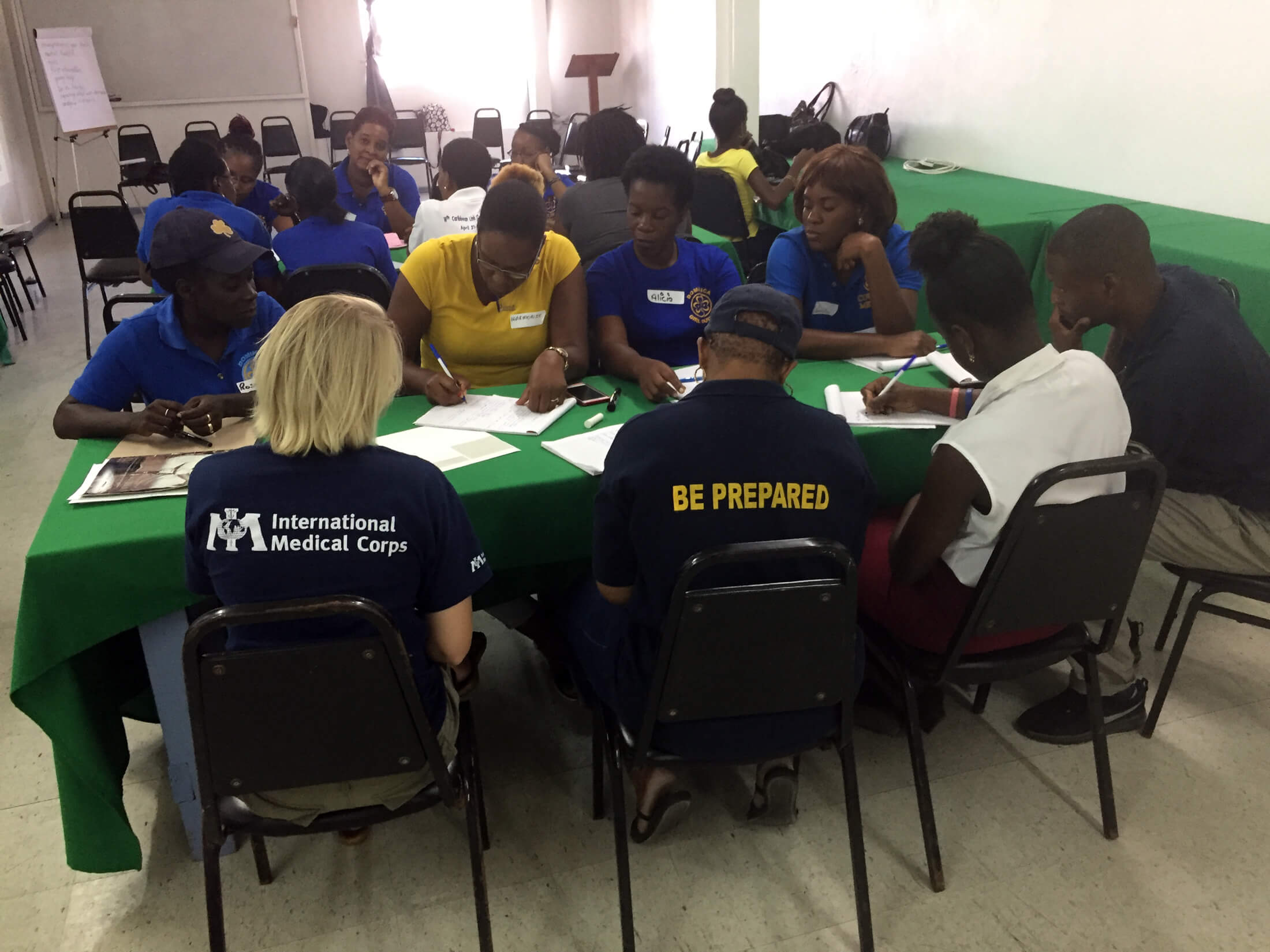International Medical Corps’ staff train local community members in Dominica to perform psychological first aid. Such training sessions—in this case, delivered shortly after Hurricane Maria—help communities better prepare for future storms.