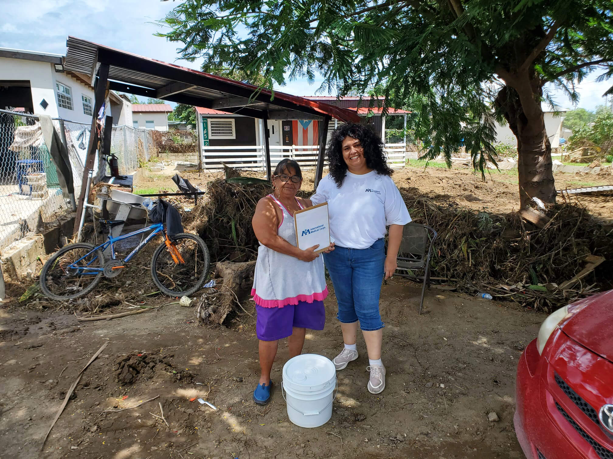 Nelida (right) is one of the people in the Salinas municipality of Puerto Rico whom we provided care to after 2022’s Hurricane Fiona. Though "the water destroyed everything," Nelida told our teams how grateful she was to receive our support, saying, "You arrived at a precious moment. You and others came to help and provide medical care. Medically speaking, this community was destroyed."