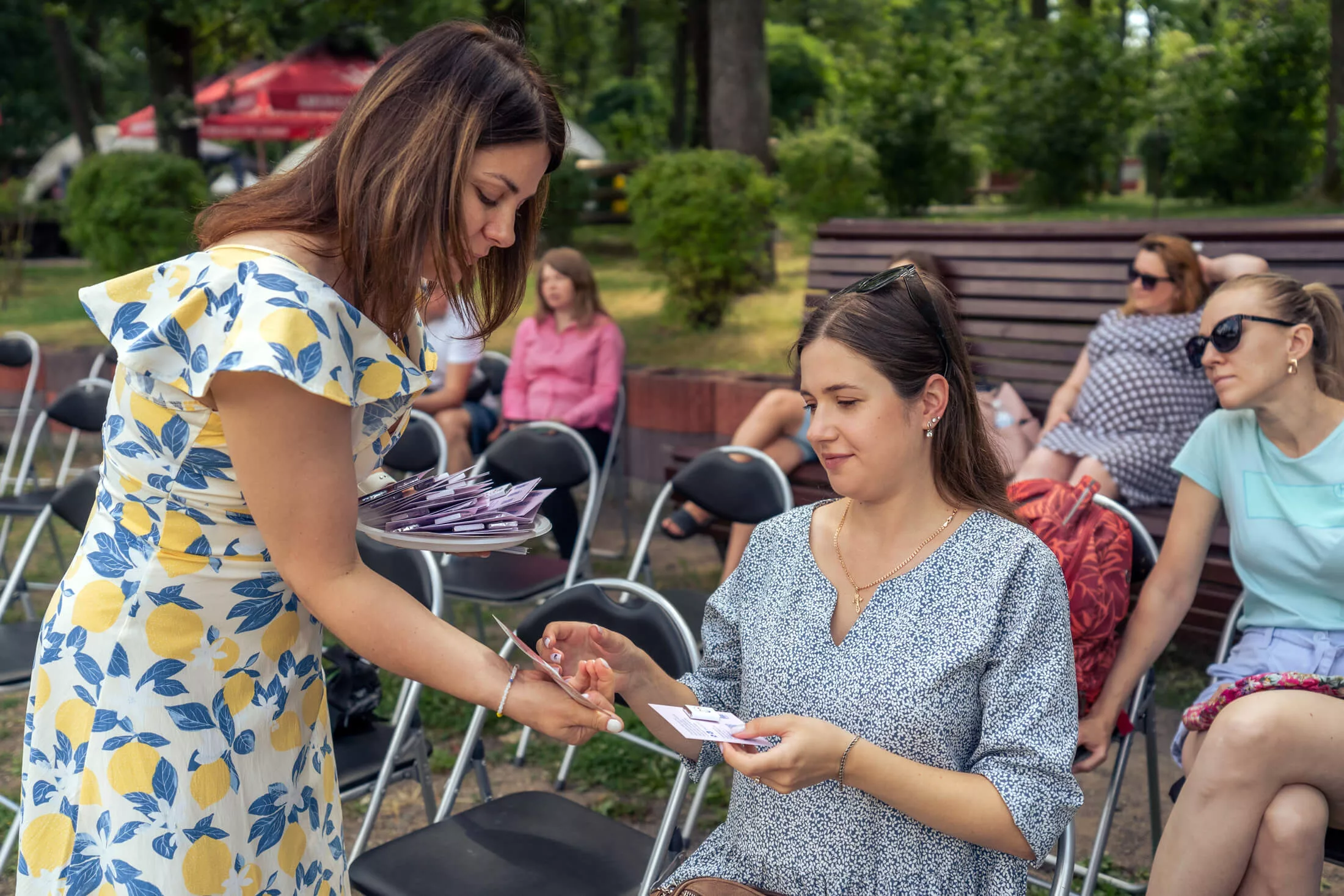 International Medical Corps staff members in Ukraine conduct lectures, gather information and hand out materials at an event for young parents and parents-to-be.