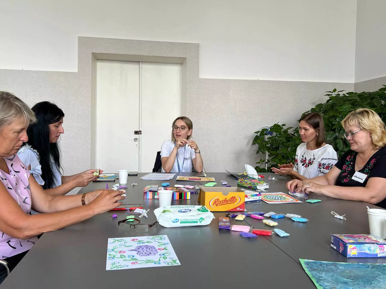 Women participate in art activities in Chernihiv, Ukraine.