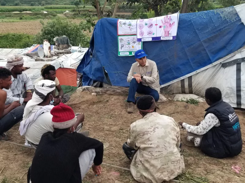 Esmail conducts a hygiene promotion session and focus group discussion at an IDP camp.