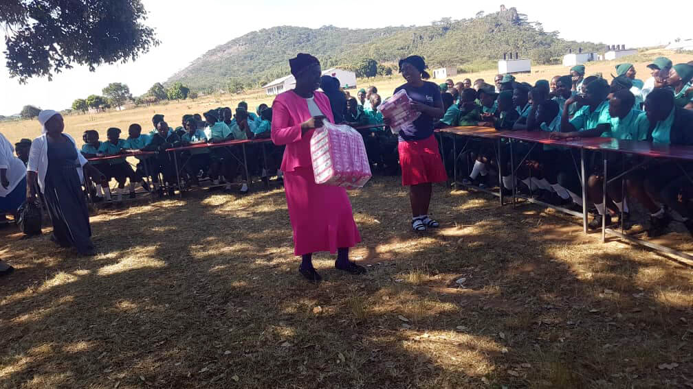 International Medical Corps donated disposable sanitary pads for women and girls in the Masunda community in Zimbabwe and raised awareness about menstrual hygiene management.