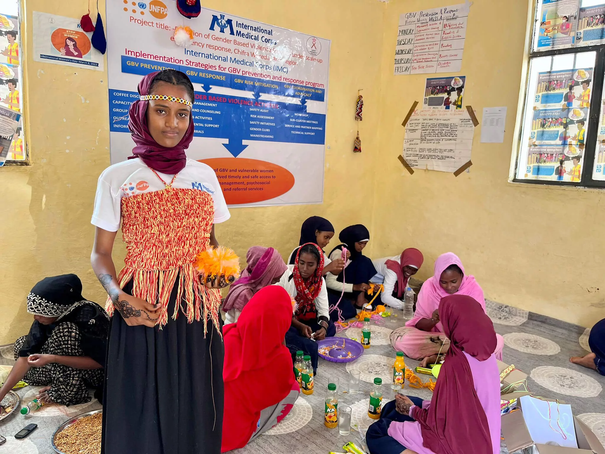 Zahara Ali displays handicrafts she made during WGSS sessions in Chifra woreda, Afar region, Ethiopia.
