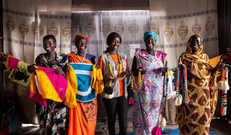 At a WGSS in Malakal, South Sudan, women display their handiwork.