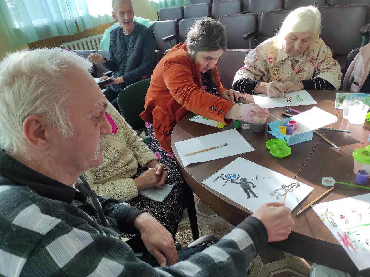 Participants of the Active Longevity Program engage in art-based activities to express themselves.