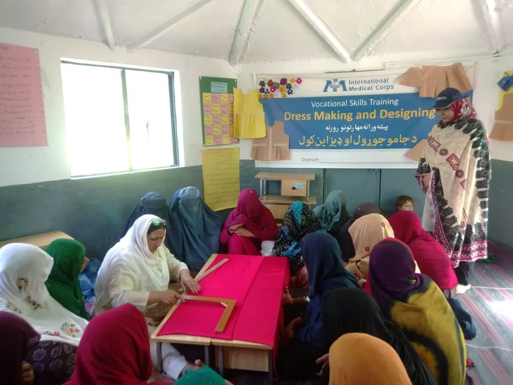 Afghan refugee women learn dressmaking and designing as part of an International Medical Corps vocational-skills training program in Khyber Pakhtunkhwa, Pakistan.