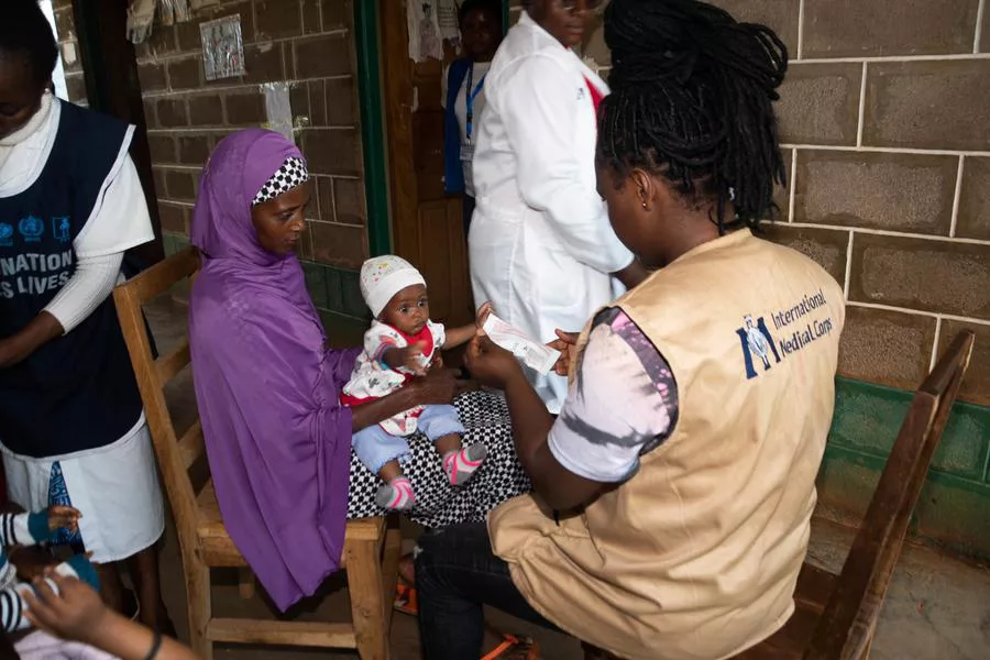 Evate Fulal Nyinchuo, Nutrition Assistant, evaluates children for malnutrition as part of the maternal, infant and young-child nutrition program at Fonfuka health outpost in Northwest Cameroon. These evaluations have led to a significant reduction in malnutrition cases across the country.