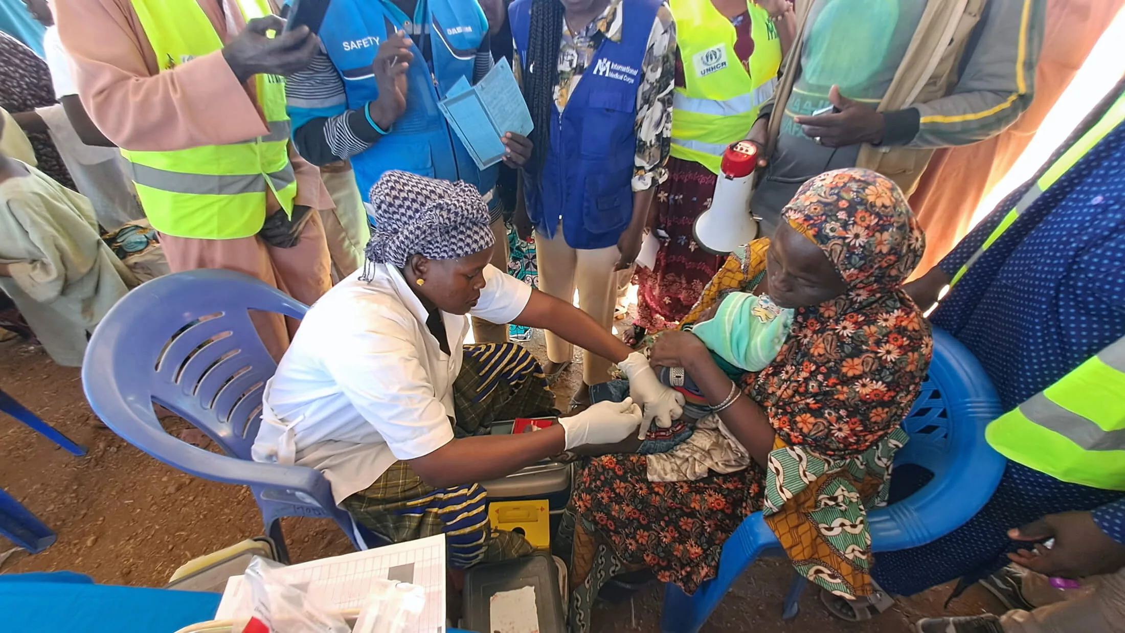 Babies receive the malaria vaccination on malaria vaccine launch day.