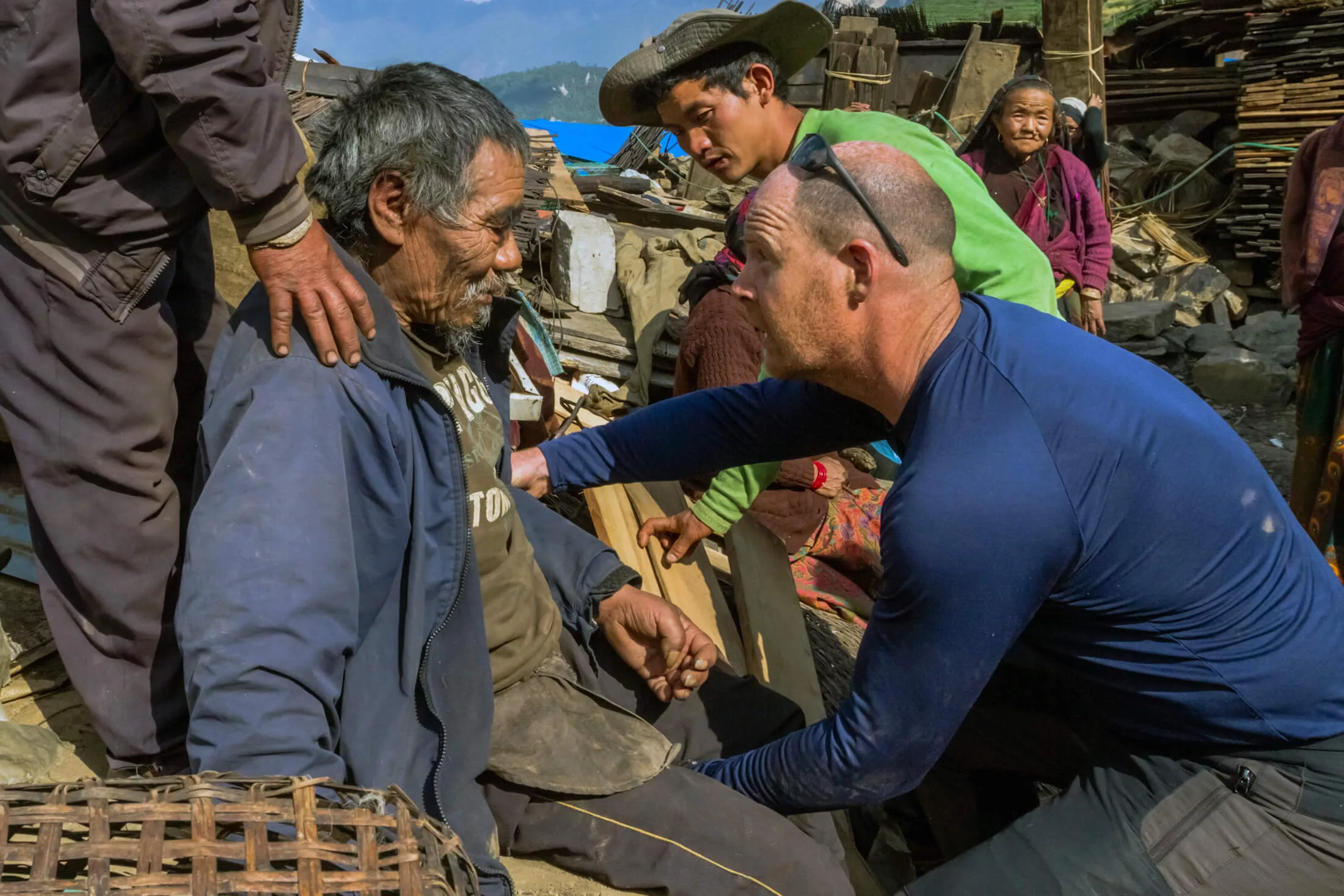 Dr. Michael Karch cares for a man who was trapped under his home for two days following the 2015 Nepal earthquakes.