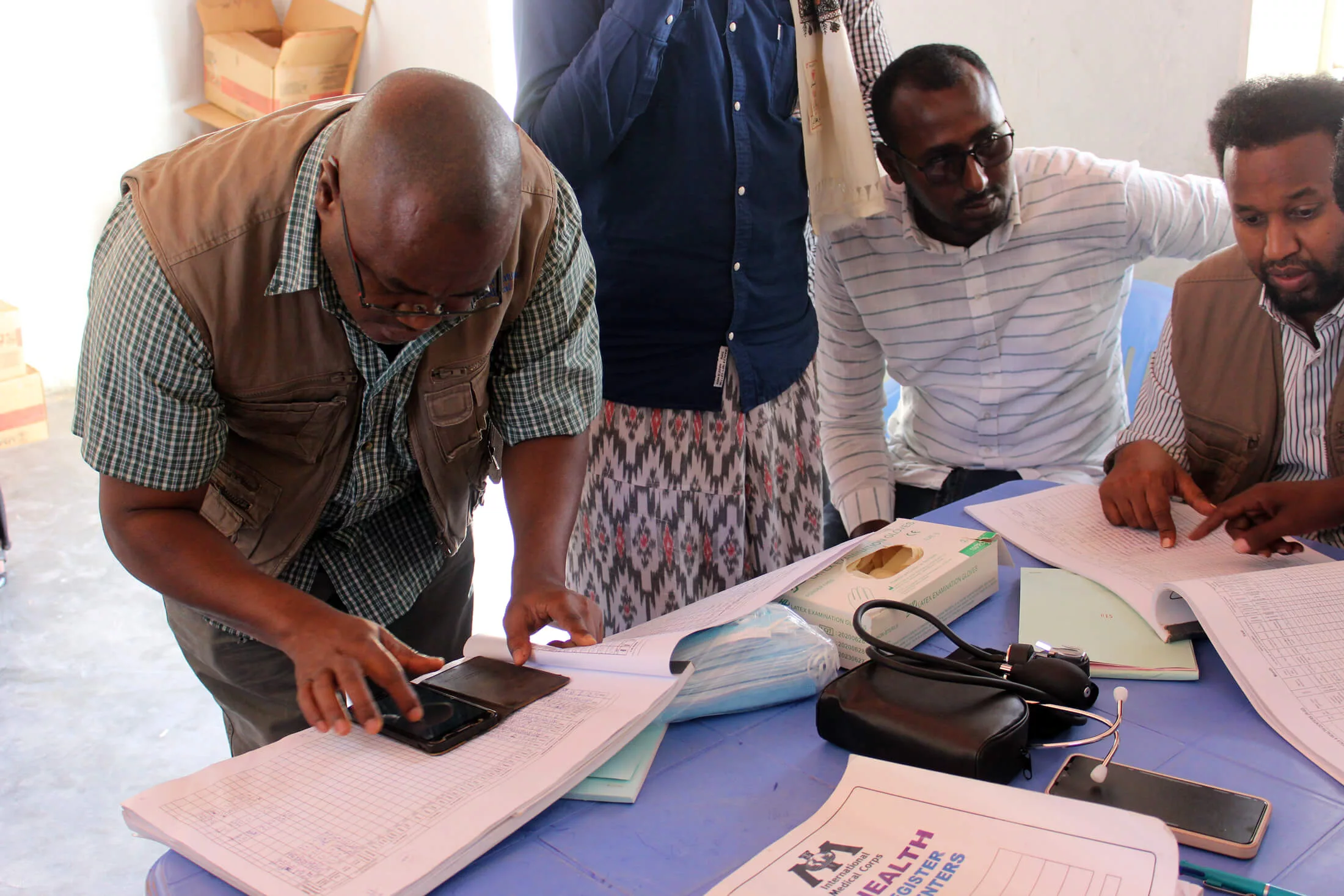 Njoroge Kamau conducts a routine data quality audit at a health facility in Galkacyo South, Somalia.
