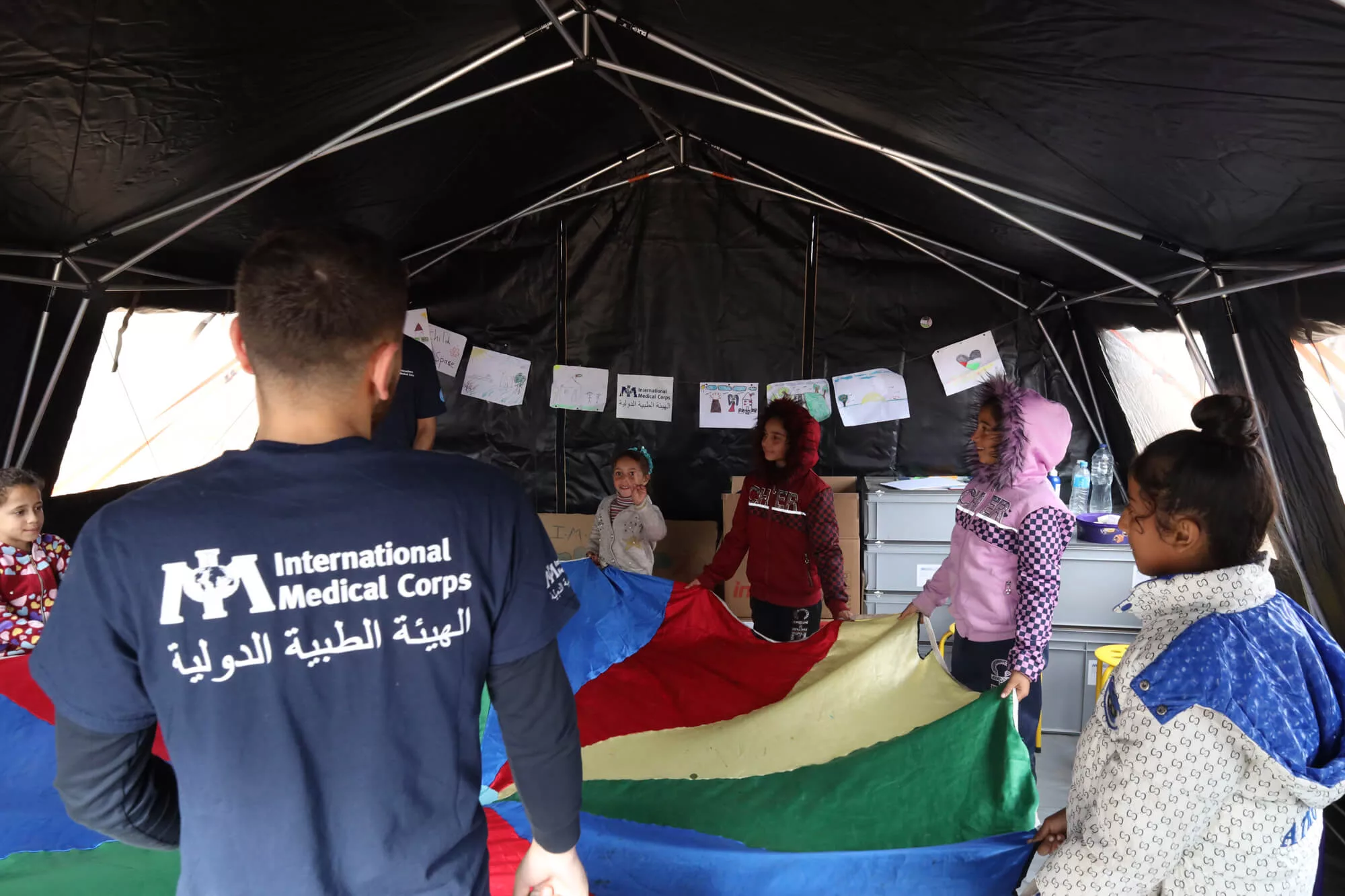 Children participate in daily activities in the child-friendly tent at our field hospital.