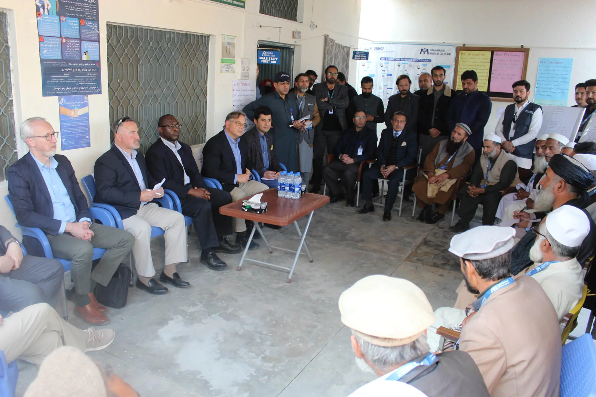 Ambassador Blome meets with International Medical Corps staff members and community leaders.