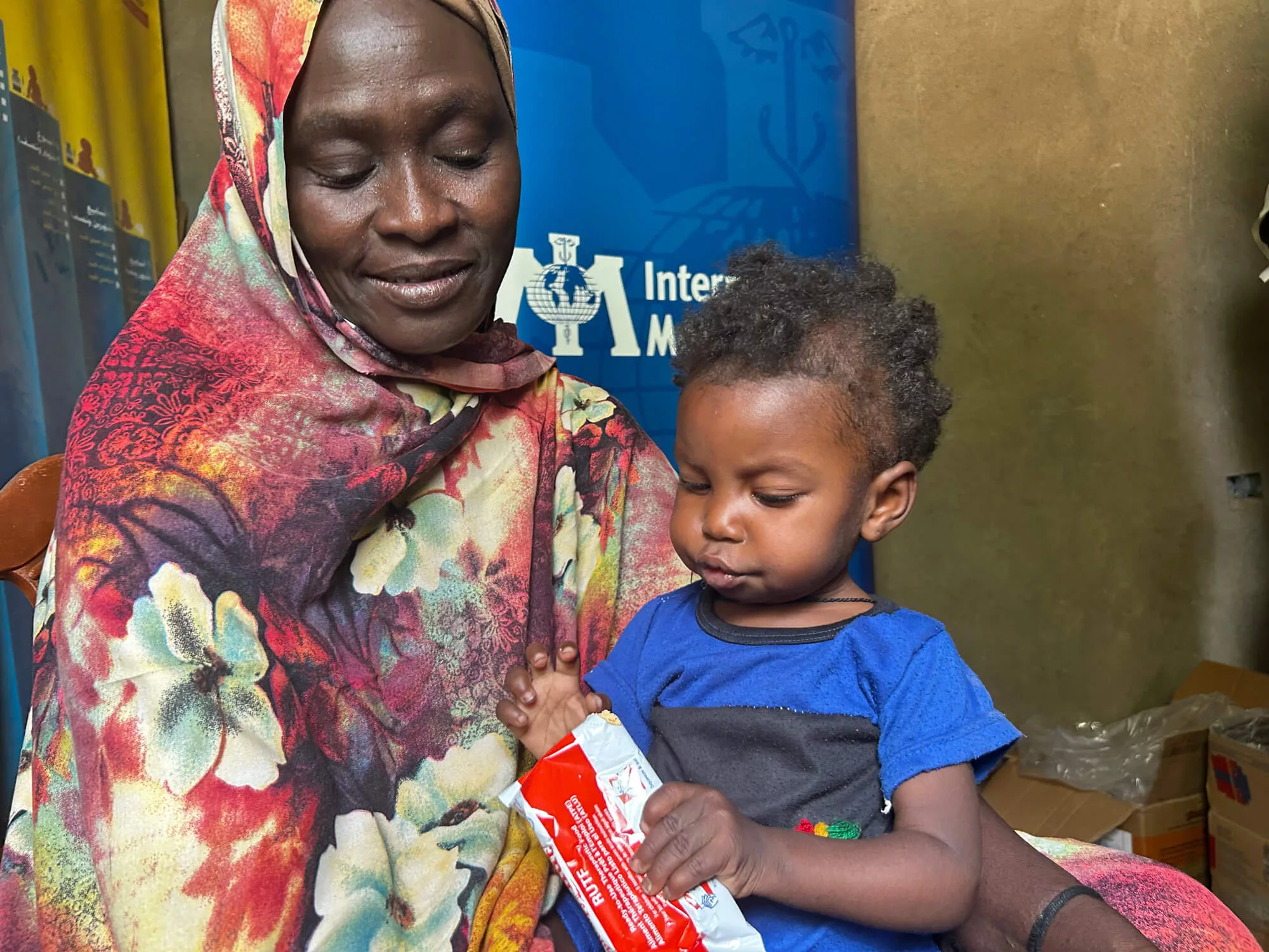 Hajer and her two-year-old granddaughter, Zainab, at the Murafaa Althany Clinic in Sennar, Sudan.