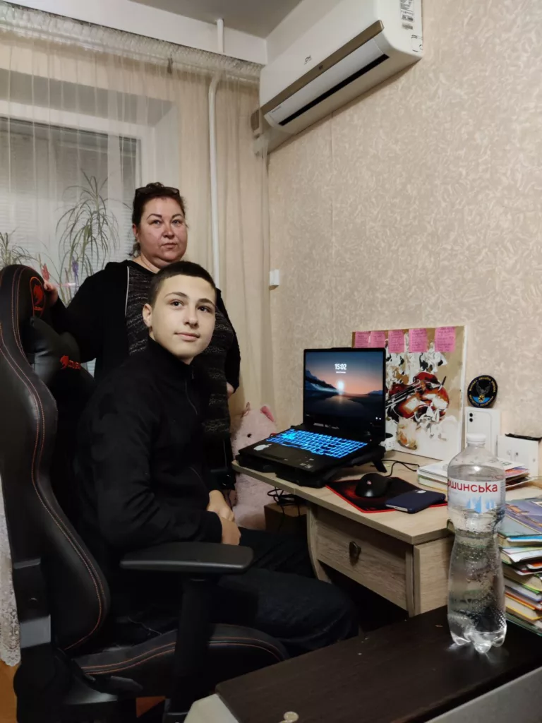 Illya and his mother at their home in Mykolaiv, a city in Ukraine that has suffered repeated Russian attacks.