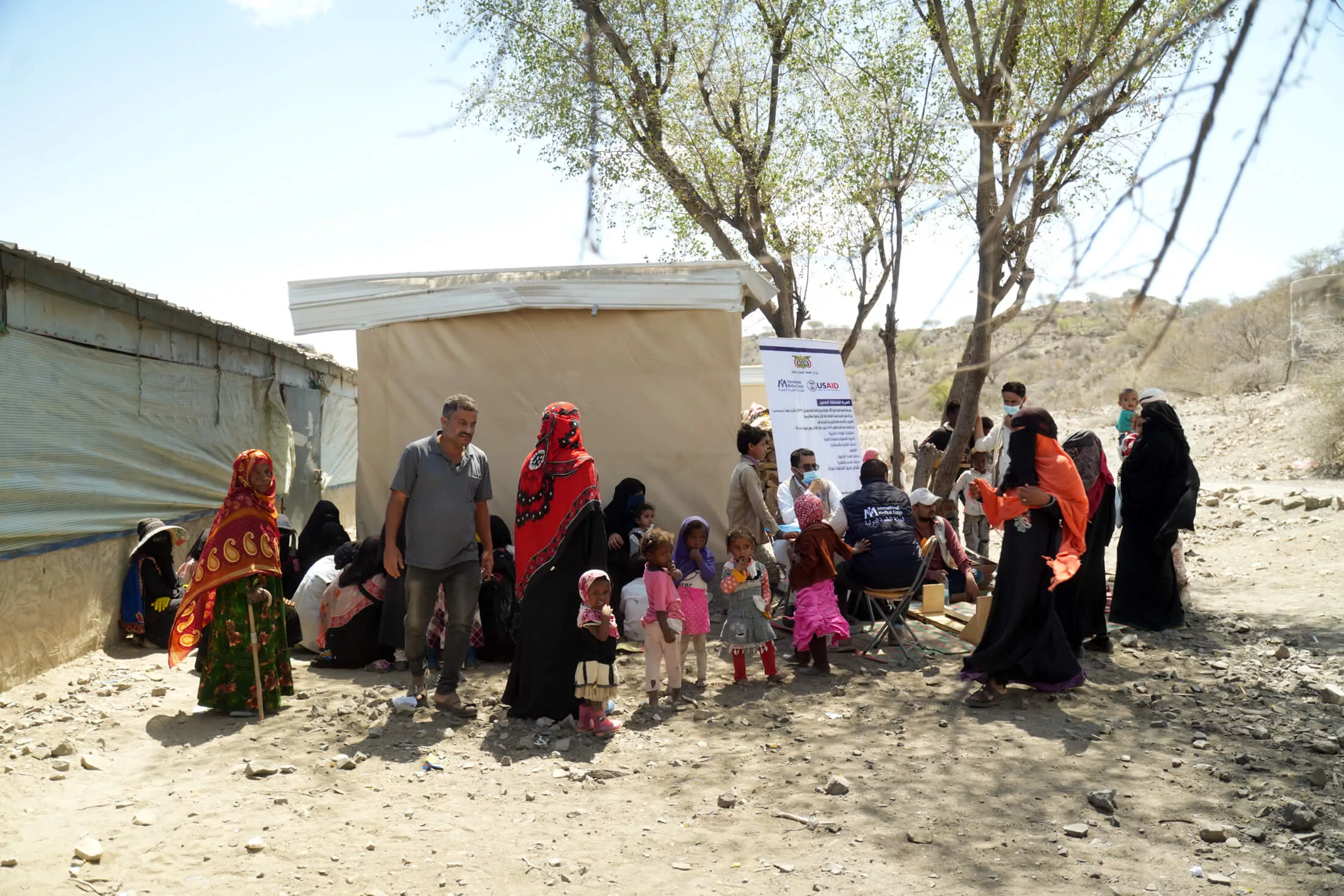 At the Al Jeef camp for internally displaced people in Al Dhale’e governorate, families and children wait in line for services from the mobile medical unit.